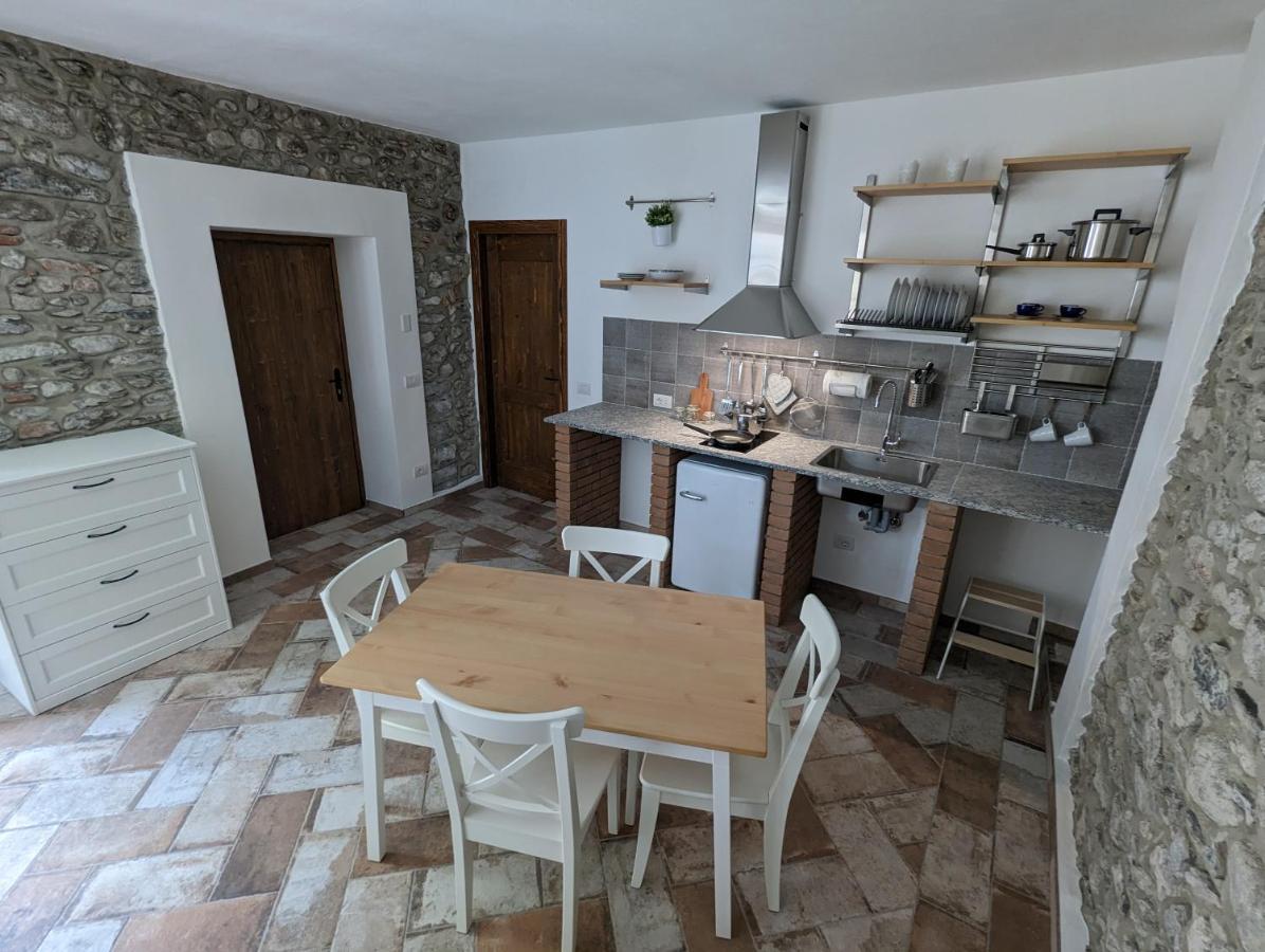 Antica Osteria Apartments Dongo Pokoj fotografie