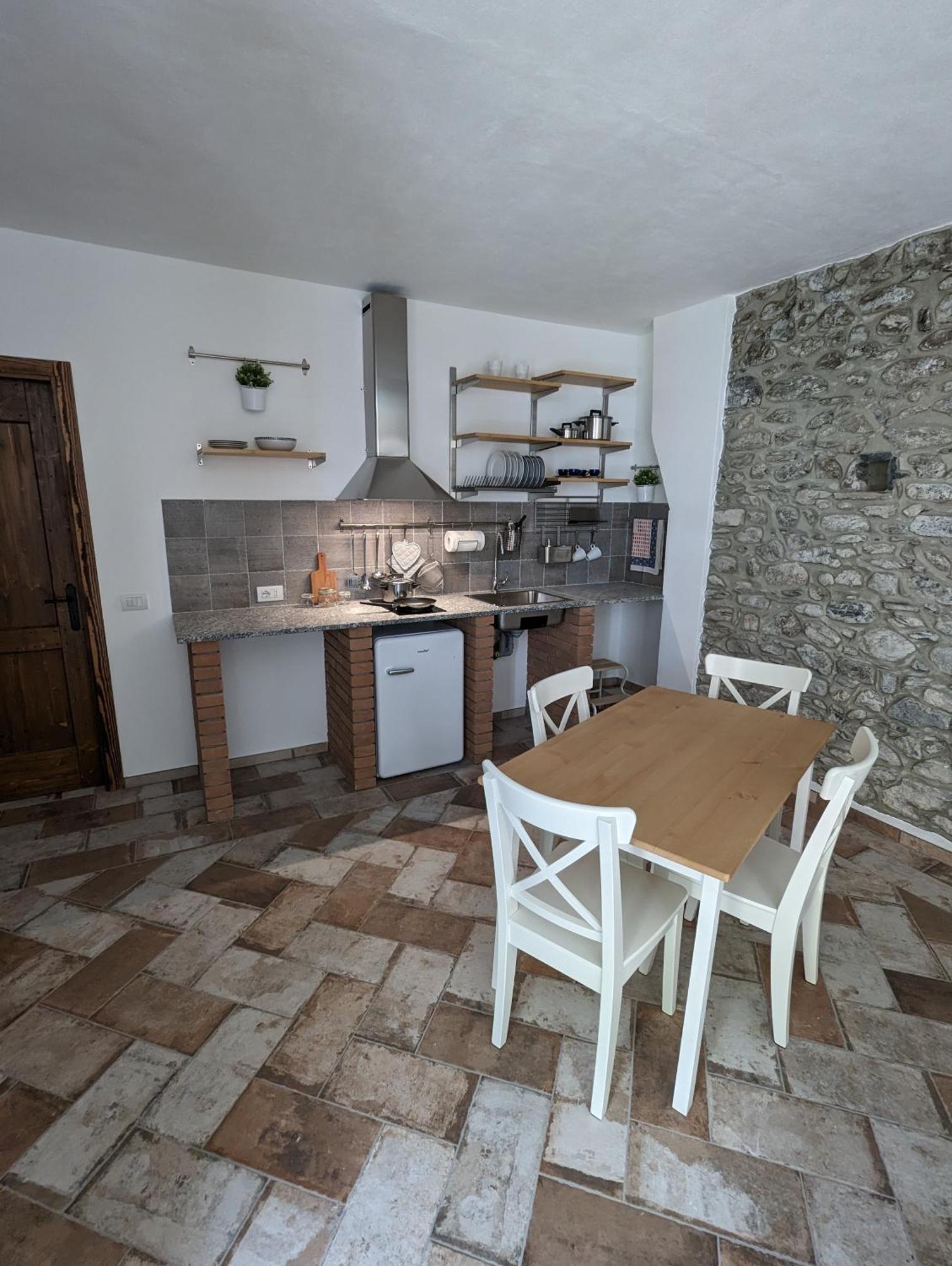 Antica Osteria Apartments Dongo Pokoj fotografie