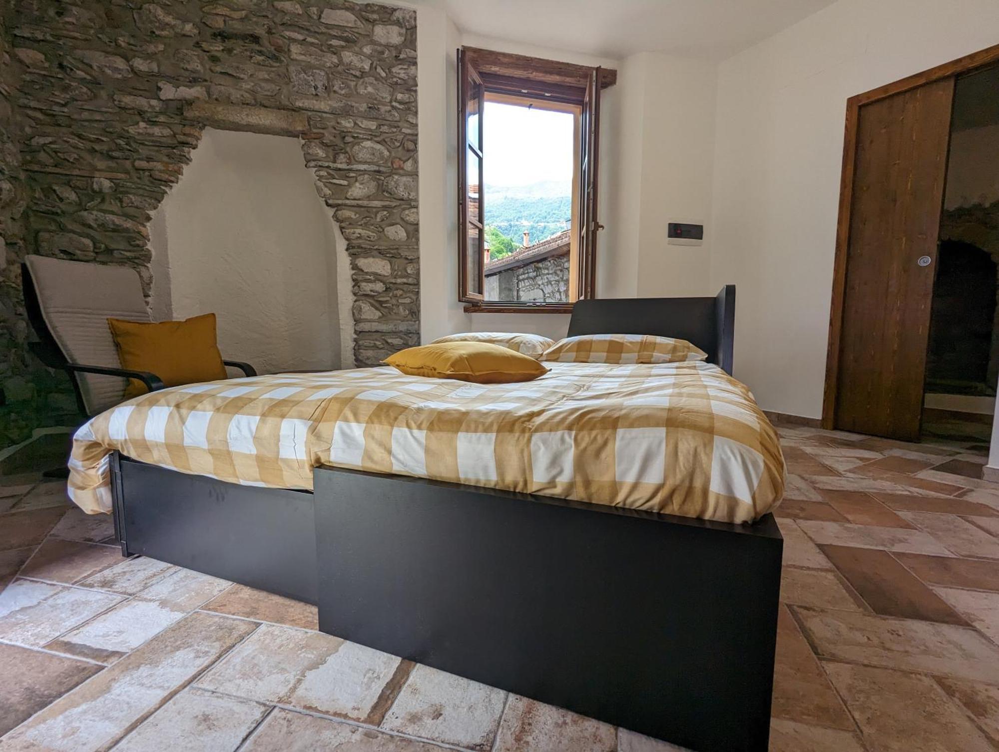 Antica Osteria Apartments Dongo Pokoj fotografie
